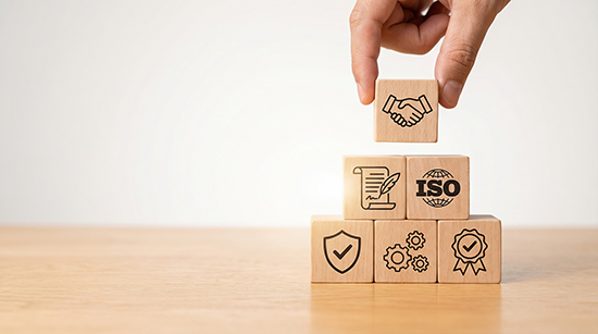 vecteezy hand stacking wooden blocks with iso certification icons 77774560@0.1x